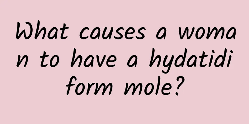 What causes a woman to have a hydatidiform mole?
