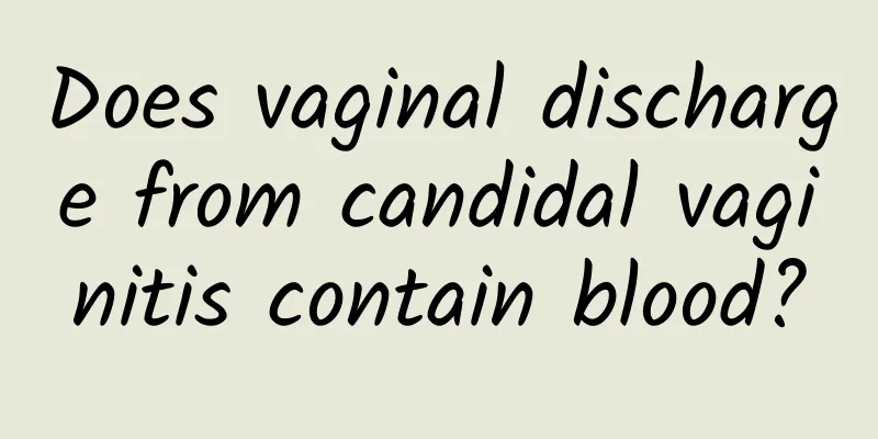 Does vaginal discharge from candidal vaginitis contain blood?