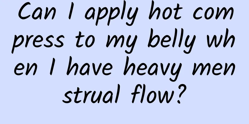 Can I apply hot compress to my belly when I have heavy menstrual flow?