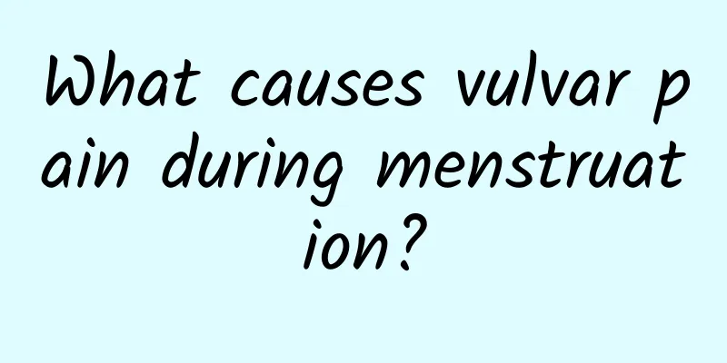 What causes vulvar pain during menstruation?
