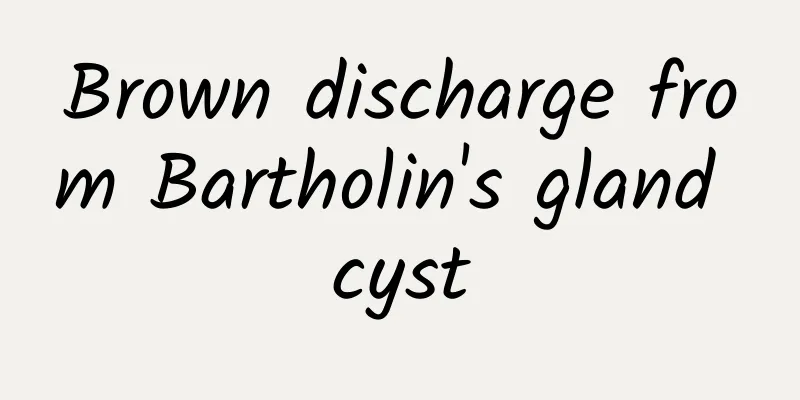 Brown discharge from Bartholin's gland cyst