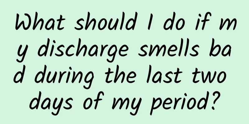 What should I do if my discharge smells bad during the last two days of my period?