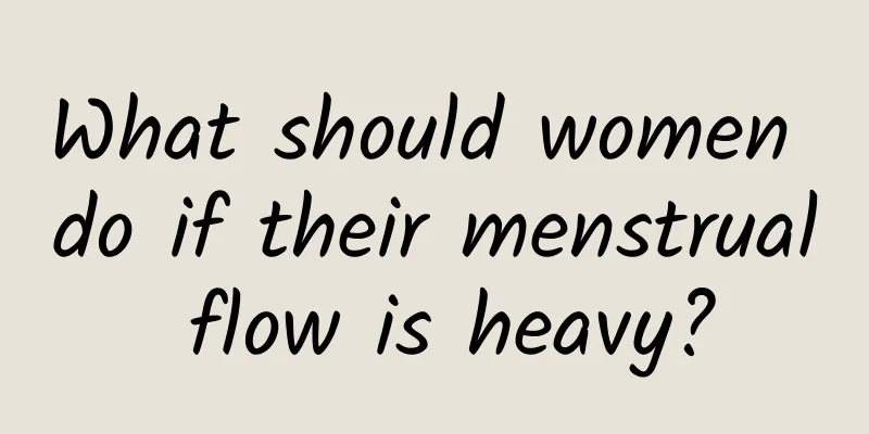 What should women do if their menstrual flow is heavy?