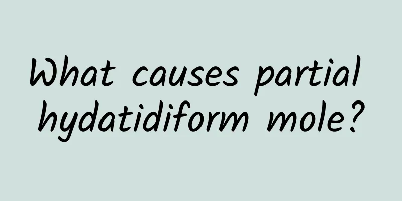 What causes partial hydatidiform mole?