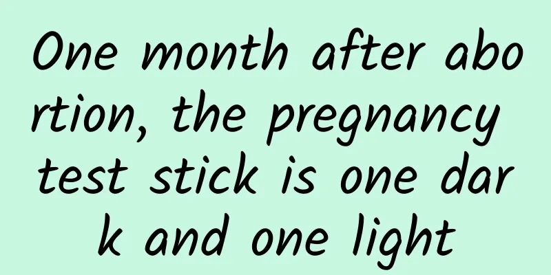 One month after abortion, the pregnancy test stick is one dark and one light