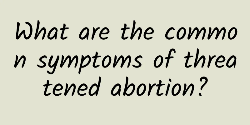 What are the common symptoms of threatened abortion?
