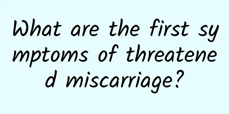What are the first symptoms of threatened miscarriage?