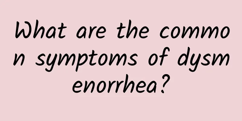 What are the common symptoms of dysmenorrhea?