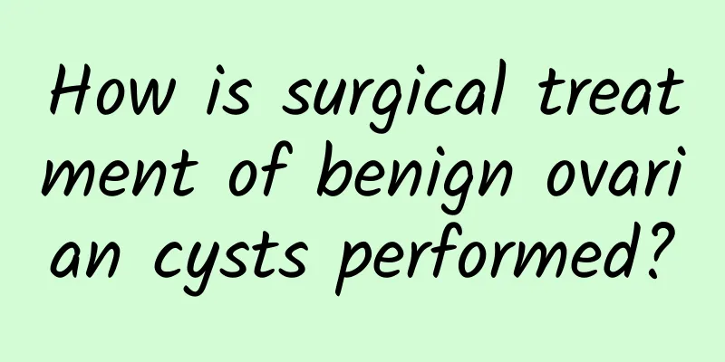 How is surgical treatment of benign ovarian cysts performed?